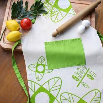 Cook APRON - Natural cotton canvas apron handprinted with flowers and leaves design.